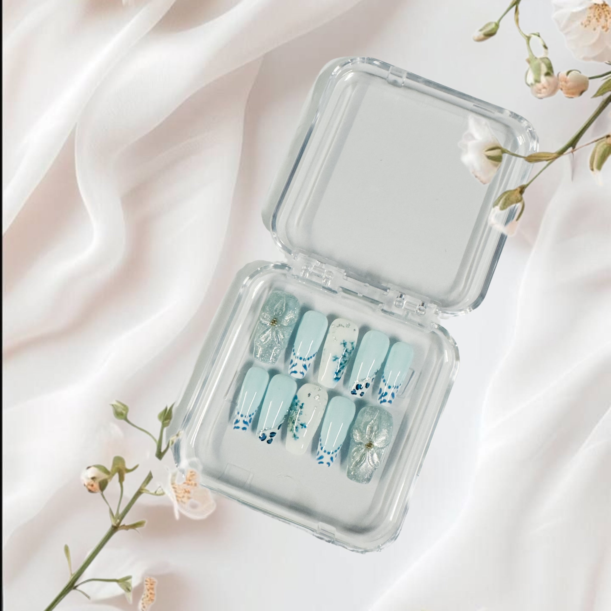 Pastel Blue Floral Press-On Nails with Bow Embellishments – Elegant & Charming