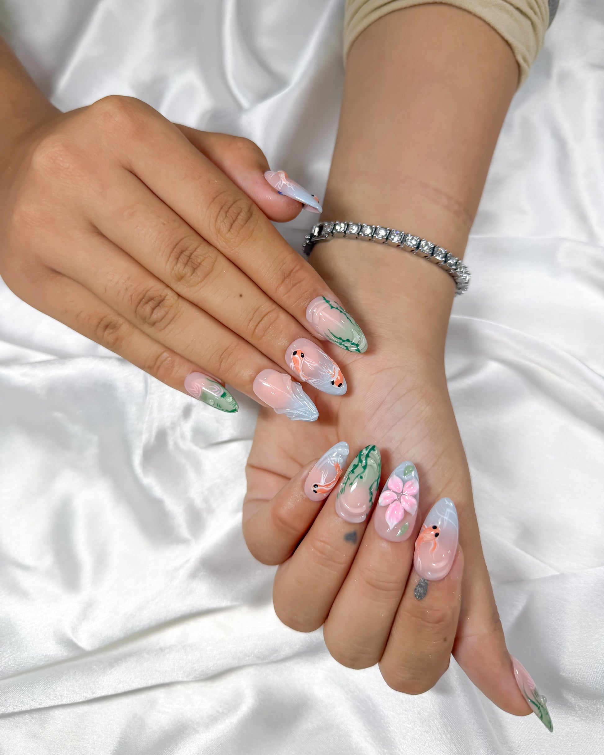Goldfish pond handmade reusable press on nails by Glossora