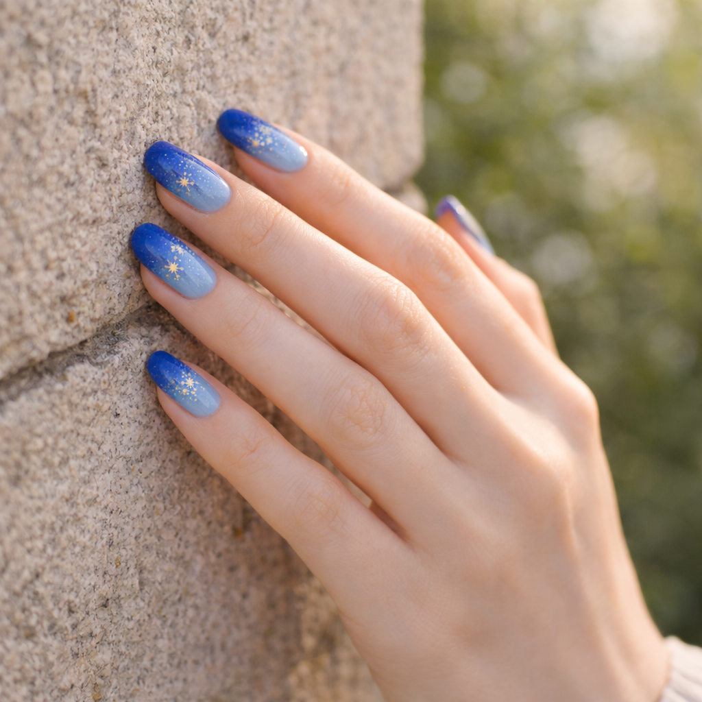 Blue ombré press-on nail set with subtle star accents 💙✨