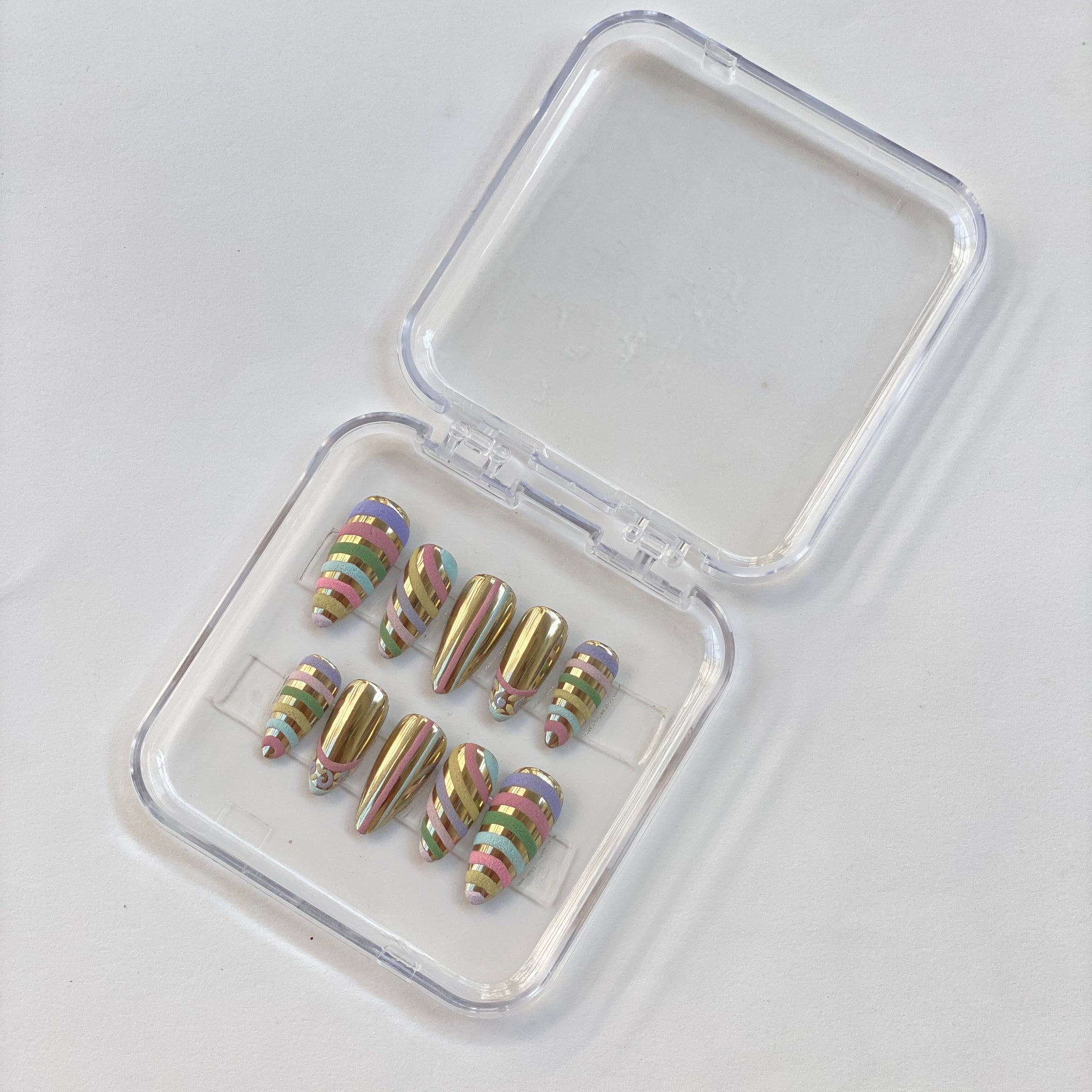 Golden Candy Swirl Nails