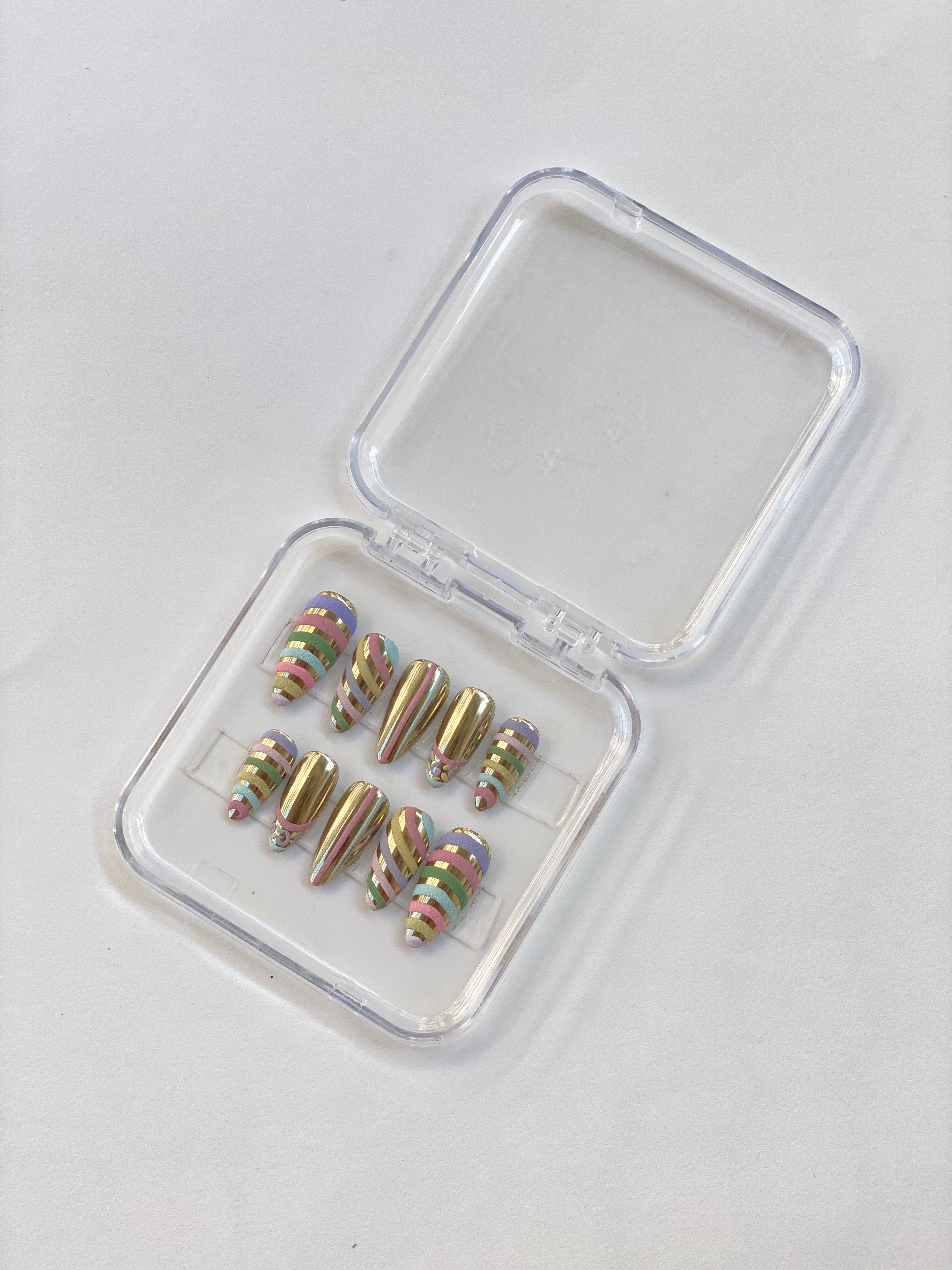 Golden Candy Swirl Nails