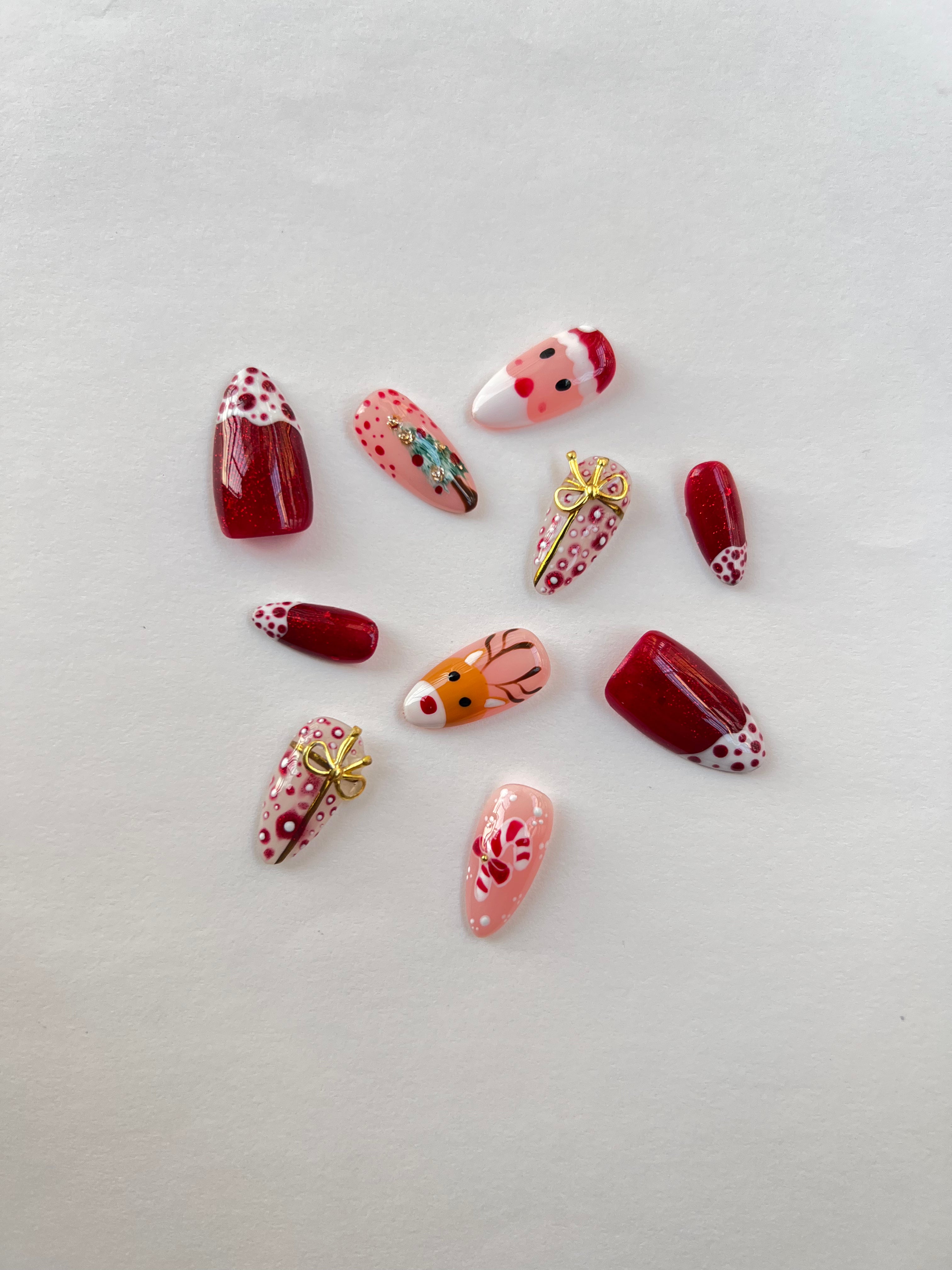 Crimson Christmas Charm Nails