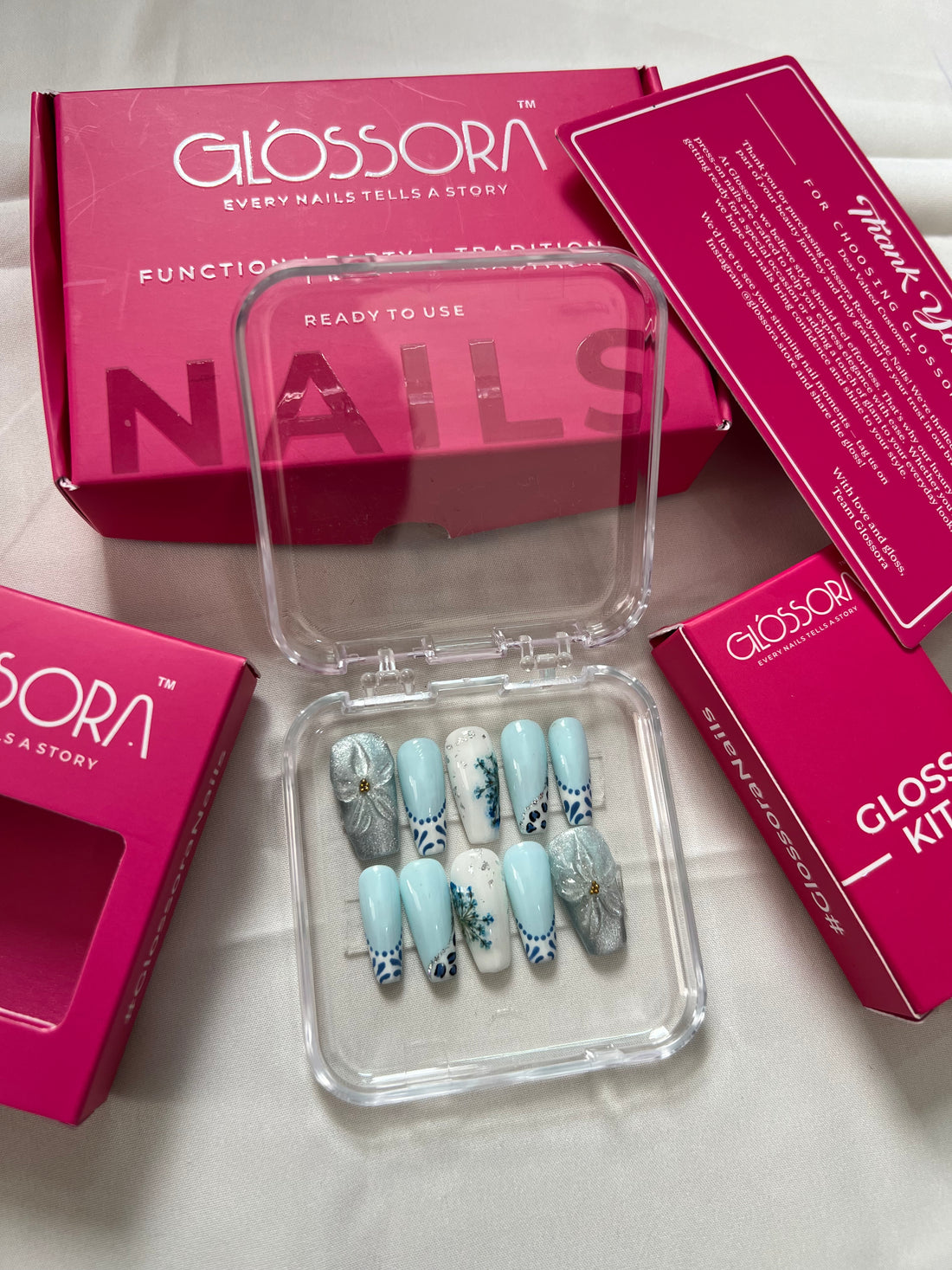 Pastel Blue Floral Press-On Nails with Bow Embellishments – Elegant & Charming