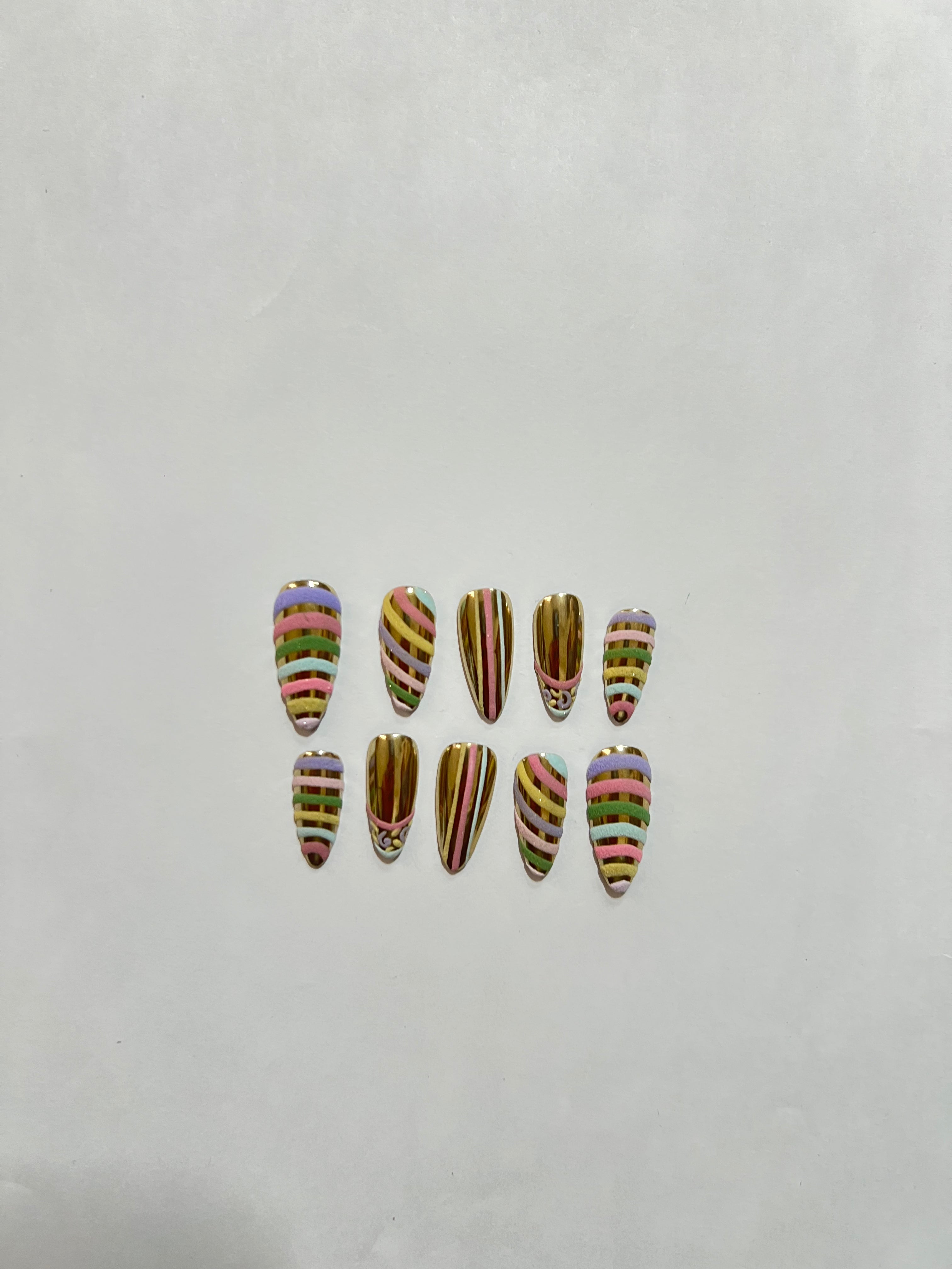 Golden Candy Swirl Nails